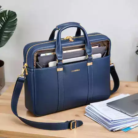 Close-up of a ManBagCo leather bag's intricate stitching and high-quality leather texture