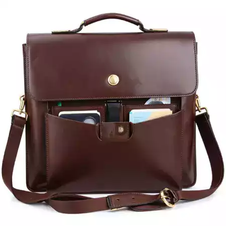 ManBagCo designer sketching a custom leather bag, illustrating bespoke design process